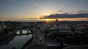 Die Sonne geht unter über dem Vatikan, den Tiber überspannt die Ponte Vittorio Emanuele II.