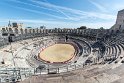 Das Amphitheater wurde zwischen dem 90 und 100 Jahr n. Chr. erbaut. Es bestand ursprünglich aus drei Geschossen mit je 60 Arkaden und bot etwa 25.000 Zuschauern Platz.Heute finden dort unblutige Stierspiele (Courses Camarguaises) wie auch Theater- und musikalischen Aufführungen statt.